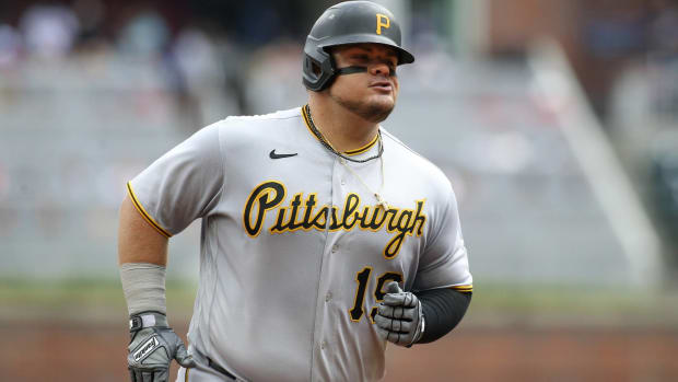 Pirates designated hitter Daniel Vogelbach rounds the bases after hitting a home run.